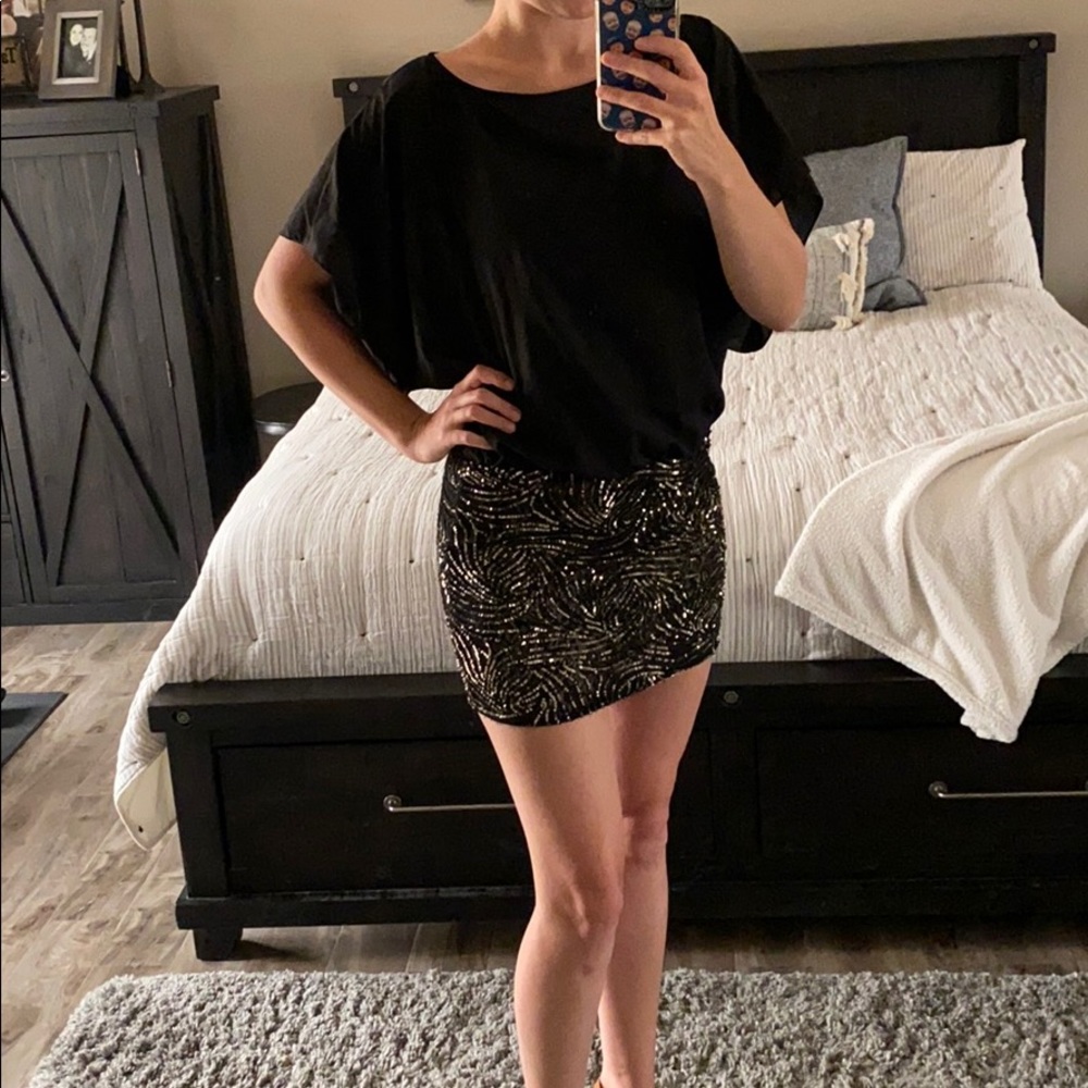 Black dress with sequin skirt